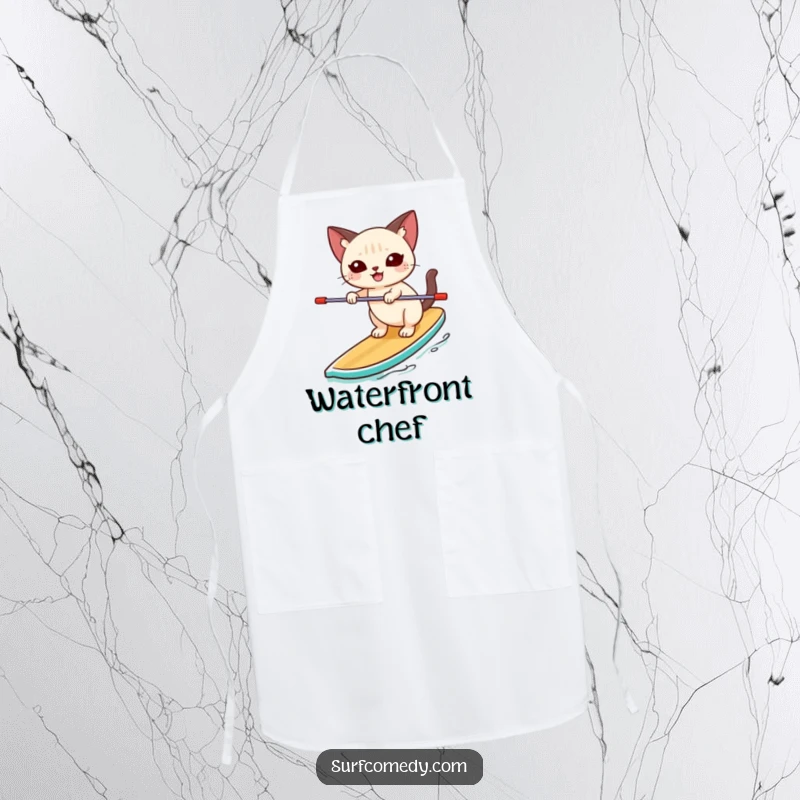 Funny Siamese cat happily balancing unsteadily on a paddleboard on a kitchen apron, adding playful water humor to cooking.