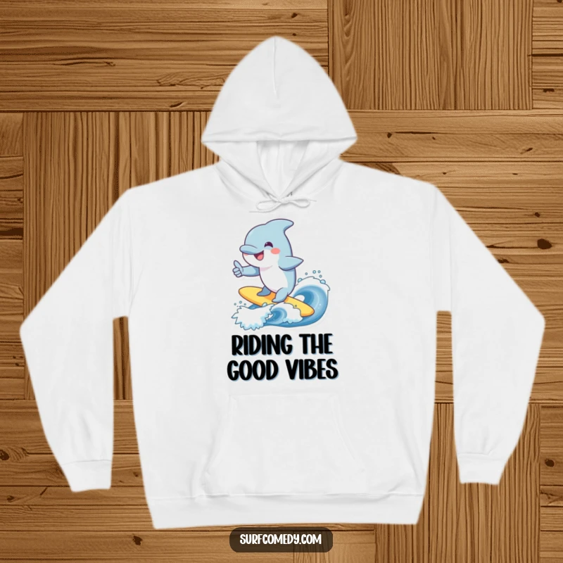 Funny dolphin hoodie, smiling character surfing a wave, giving a thumbs up, cozy and cheerful, great funny gift.
