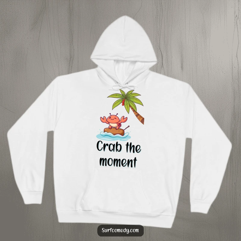 Funny hoodie featuring a sweet Kawaii crab character attempting to surf on a miniature coconut, embodying beachy fun.