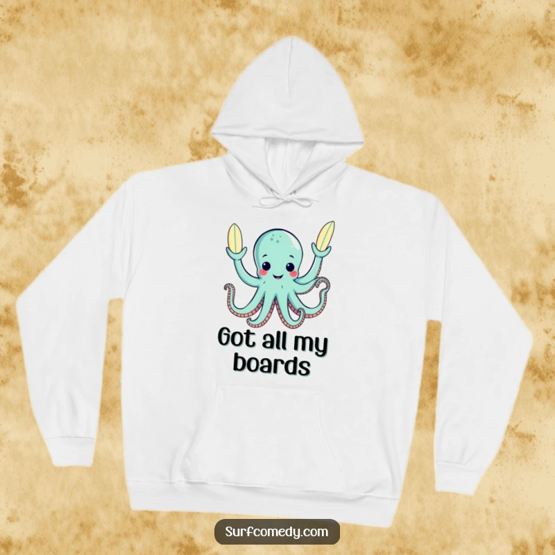 Cozy funny hoodie featuring a happy octopus character juggling three small surfboards with its tentacles.