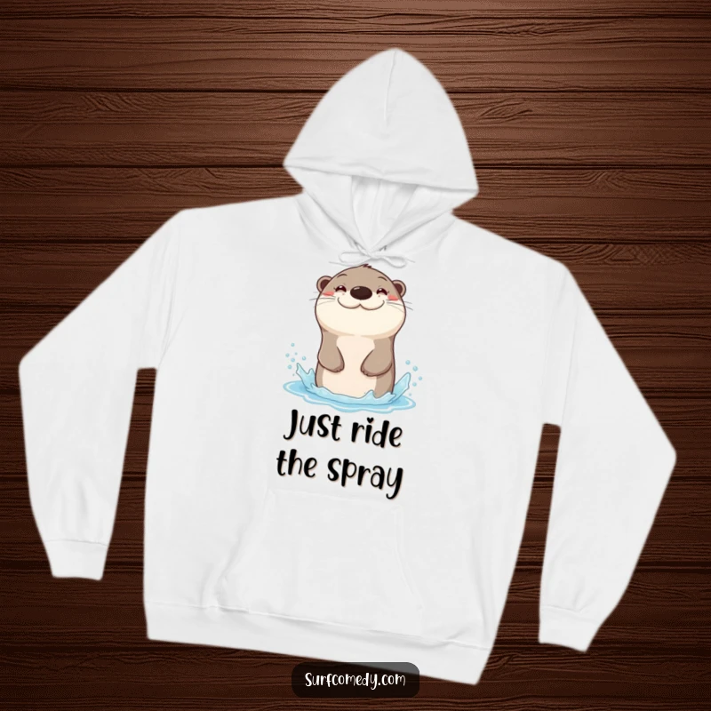 Cozy funny hoodie featuring a sea otter with a wide grin, sliding down a water spray.