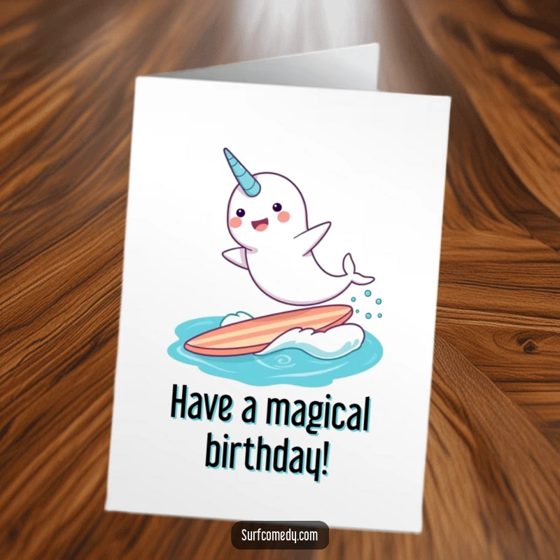 Funny free printable birthday card featuring a cheerful narwhal leaping joyfully out of the water on a surfboard.