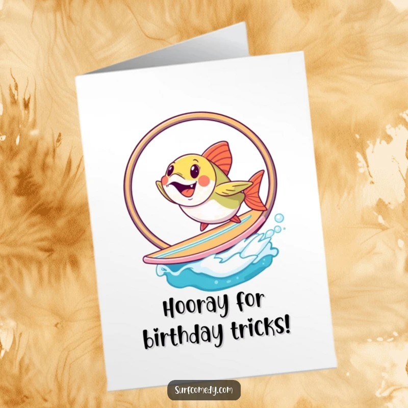 Funny Free Printable Birthday Card: A cheerful fish character leaping through a hoop while balancing on a surfboard, celebrating with joy.