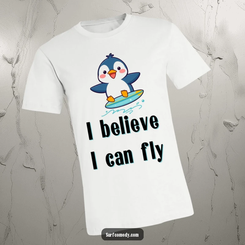 Funny penguin character trying to balance on a small surfboard with a determined yet comical look, on a t-shirt.