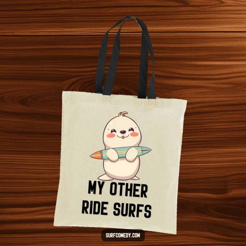 Funny seal character balancing a surfboard on its nose, printed on a durable tote bag for beach trips.
